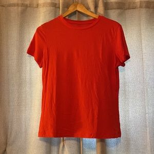 T-shirt by a new day.